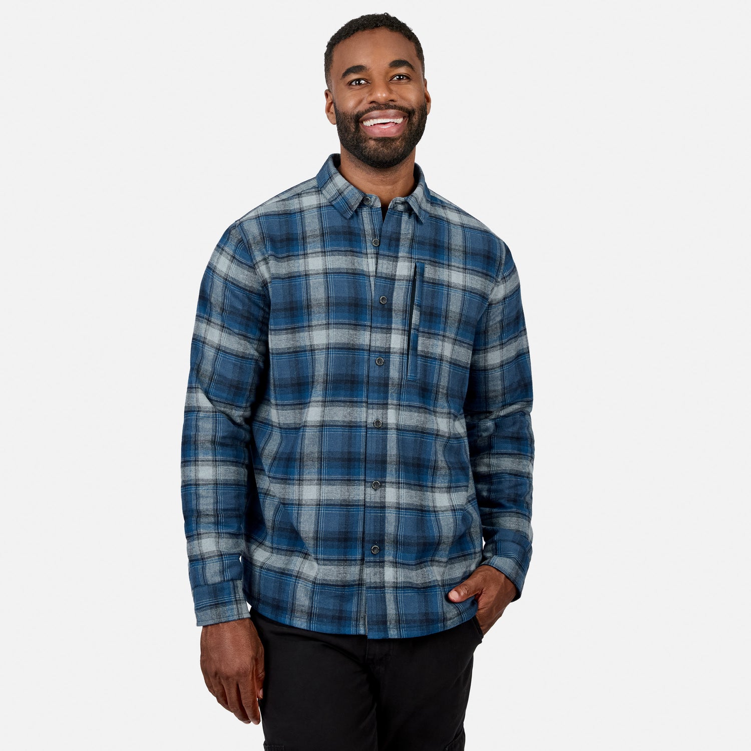 [Model is wearing size M.] Smiling man wearing Men's Easywear II fleece lined blue plaid flannel shirt.