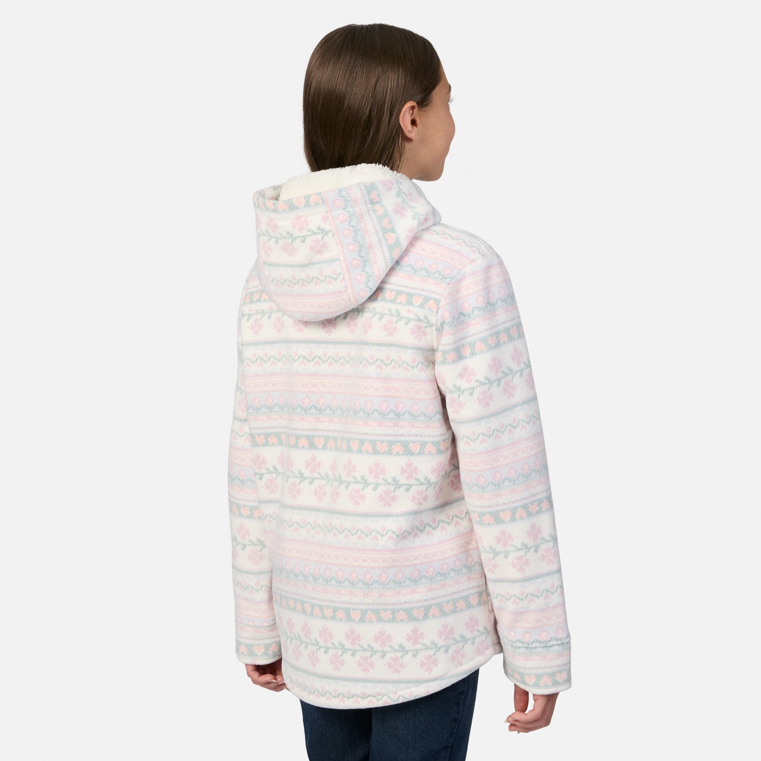 Back view of a girl wearing a cream-colored, sherpa-lined Girls’ Chill Out Fleece Shirt Jacket featuring a pastel-colored Nordic-inspired plaid print.