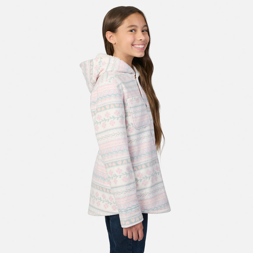 A girl smiles while wearing a pink and blue plaid Girls’ Chill Out Fleece Shirt Jacket with a hood and button-up front.
