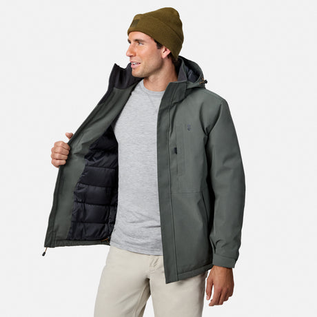 Man with beanie wearing Denali insulated jacket open at front revealing black quilted lining and gray shirt