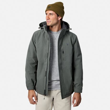 Man in Denali insulated jacket with hood open showing black quilted interior beanie on