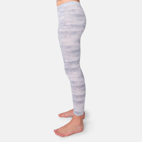 Gray and white marbled leggings worn by a person on a light gray background