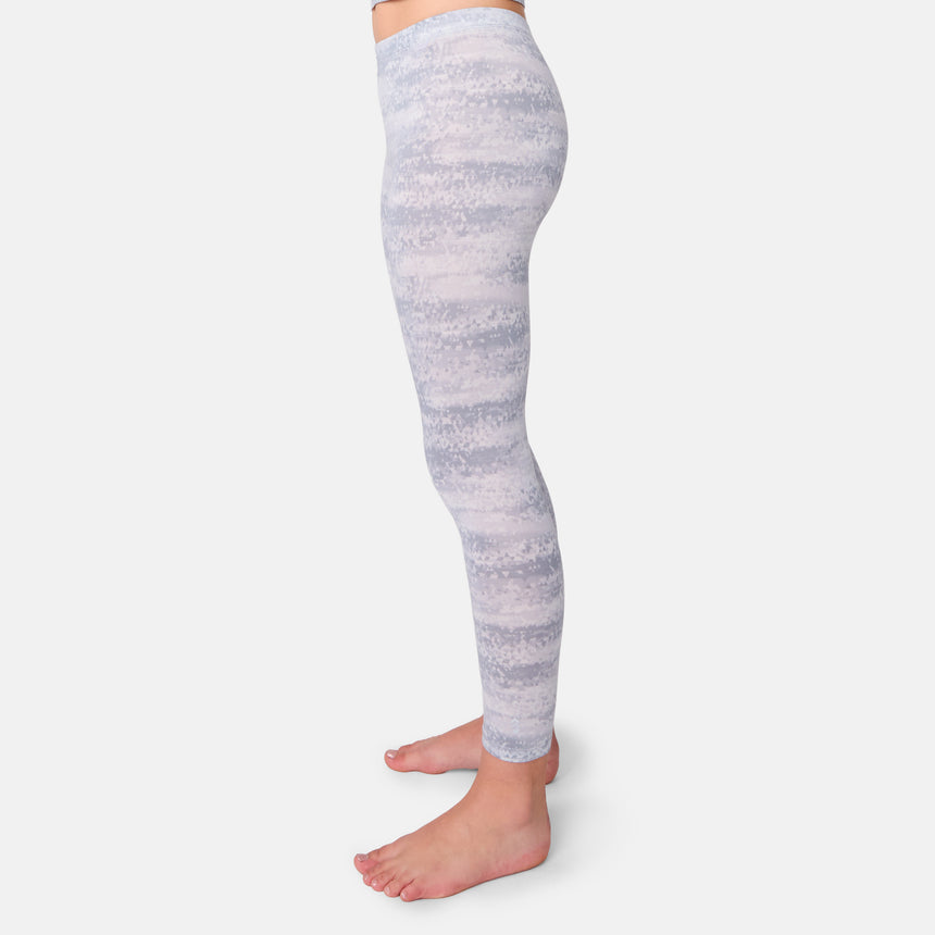 Gray and white marbled leggings worn by a person on a light gray background