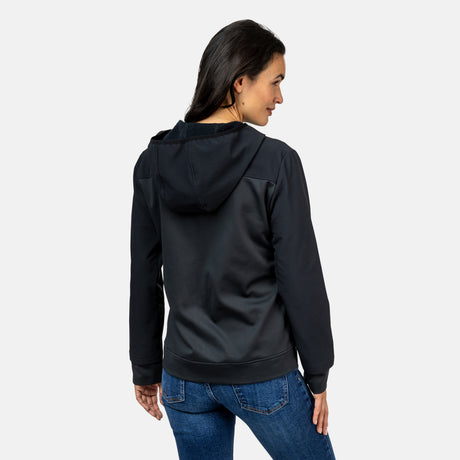 [Scarlett is 5’10" wearing a size Small.] Woman wearing Free Country Women's Venture Out Hybrid Jacket in black with a full front zipper opening, lower pockets, stretch panels, a hood, and water resistant and wind resistant stretch performance fabric, light grey background. Best women’s jacket for all weather.