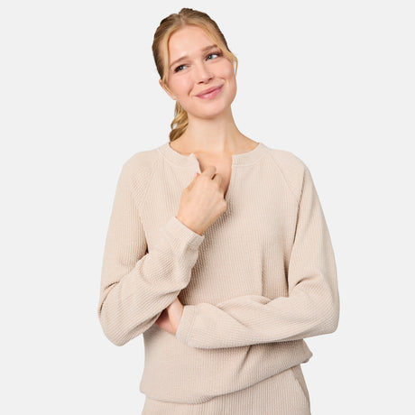 [Emily is 5'10" wearing size S] Woman wearing a beige sweater against a white background