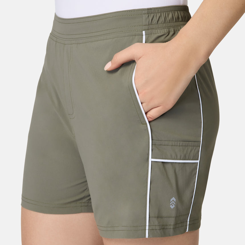 [Model is wearing size S] Green athletic shorts with white accents on a plain background