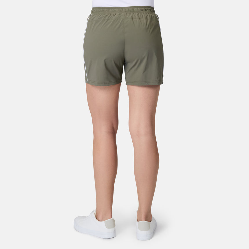 [Model is wearing size S] Person wearing olive green shorts on a white background