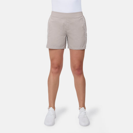 [Model is wearing size S] Person wearing beige shorts on a white background