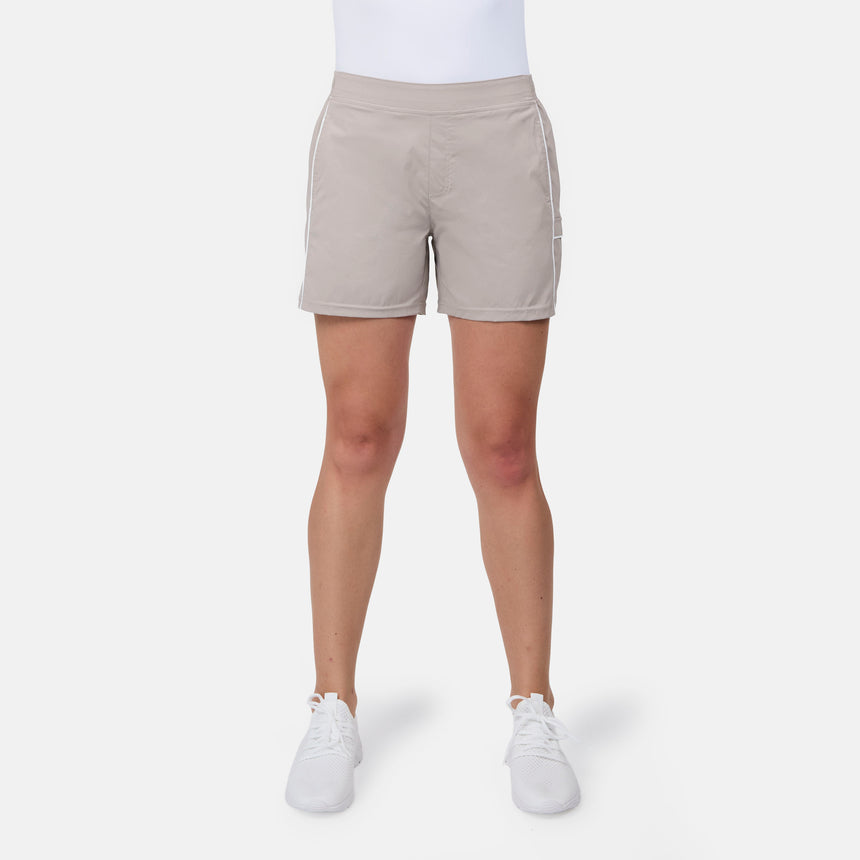 [Model is wearing size S] Person wearing beige shorts on a white background