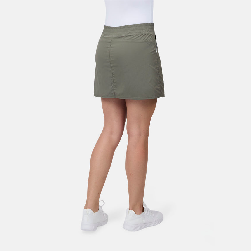 [Model is wearing size S] Person wearing a green skirt on a white background