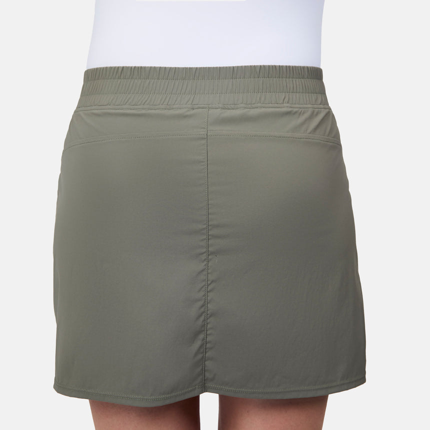 [Model is wearing size S] Green skirt worn by a person on a white background