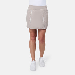 [Model is wearing size S] Beige skirt worn by a person on a white background