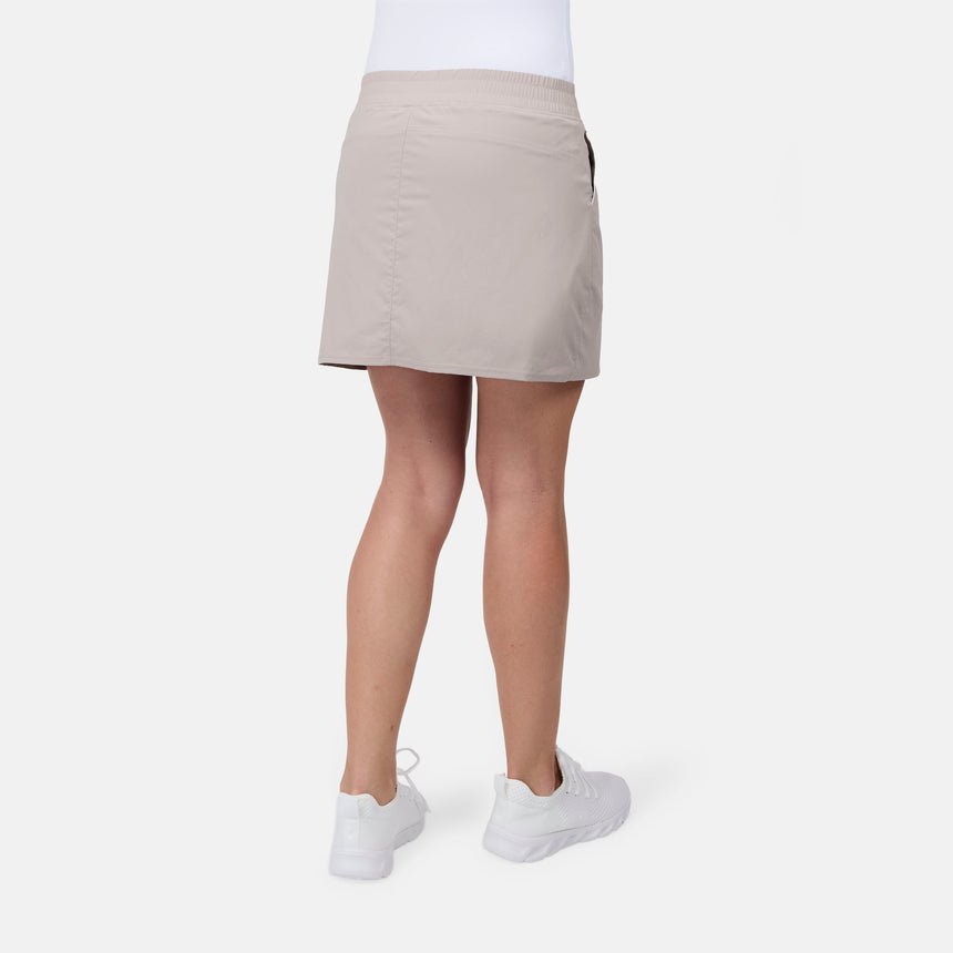 [Model is wearing size S] Beige skirt worn by a person on a white background