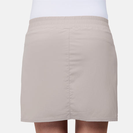 [Model is wearing size S] Beige skirt worn by a person on a white background