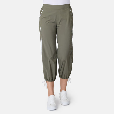 [Model is wearing size S] Green capri pants worn by a person on a white background