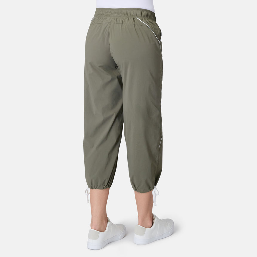 [Model is wearing size S] Person wearing olive green pants on a white background