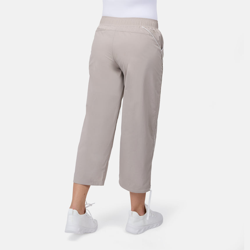 [Model is wearing size S] Beige pants worn by a person on a white background