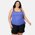 [Melissa is 5'10" wearing size 1X] Woman wearing a blue tank top and black shorts on a white background