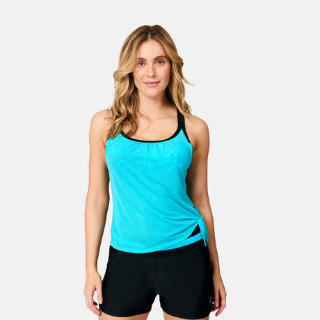 [Brooke is 5'9" wearing size S] Woman wearing a blue athletic tank top and black shorts on a white background