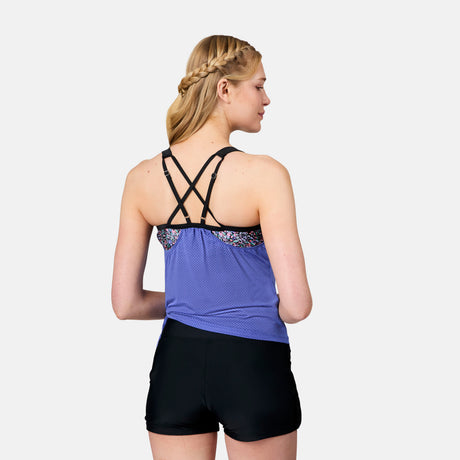 [Emily is 5'10" wearing size S] Woman wearing a purple athletic top and black shorts on a white background