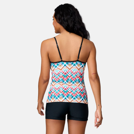 A woman with long dark hair is seen from behind wearing the Clearance Women's Zigzag Zest 2-in-1 Keyhole Tankini Top with black straps and black swim shorts, made from quick-drying fabric, against a plain light background.