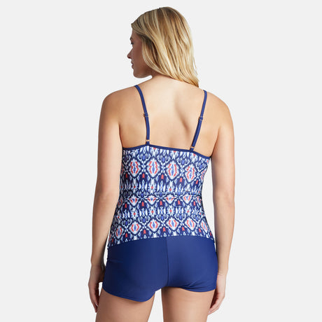 A woman with blonde hair is shown from the back, modeling the Clearance Women's Cascade Ikat 2-in-1 Keyhole Tankini Top with adjustable straps and matching swim shorts, made from quick-drying fabric. The background is plain white.