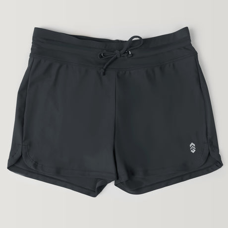Free Country Women's Drawstring Swim Short in black features a drawstring waistband, quick-dry fabric, and a subtle logo on the lower left leg, displayed against a plain light background.