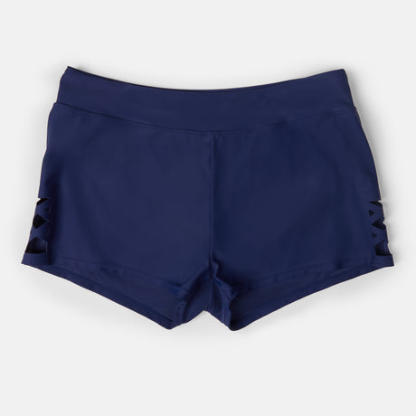 The Free Country Women's Laser Cut Boyshort, navy blue athletic shorts crafted from recycled materials, features a wide waistband and crisscross lattice cutouts on the sides, shown on a white background.