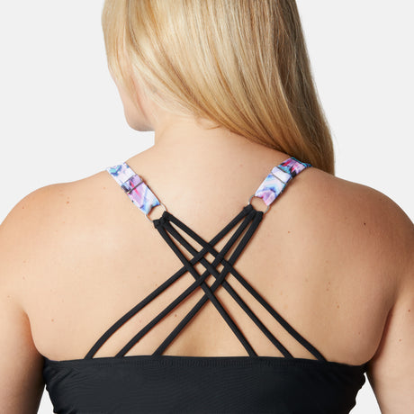 [Lola is 5'10" wearing size S] Black strappy top with floral straps worn by a person on a white background