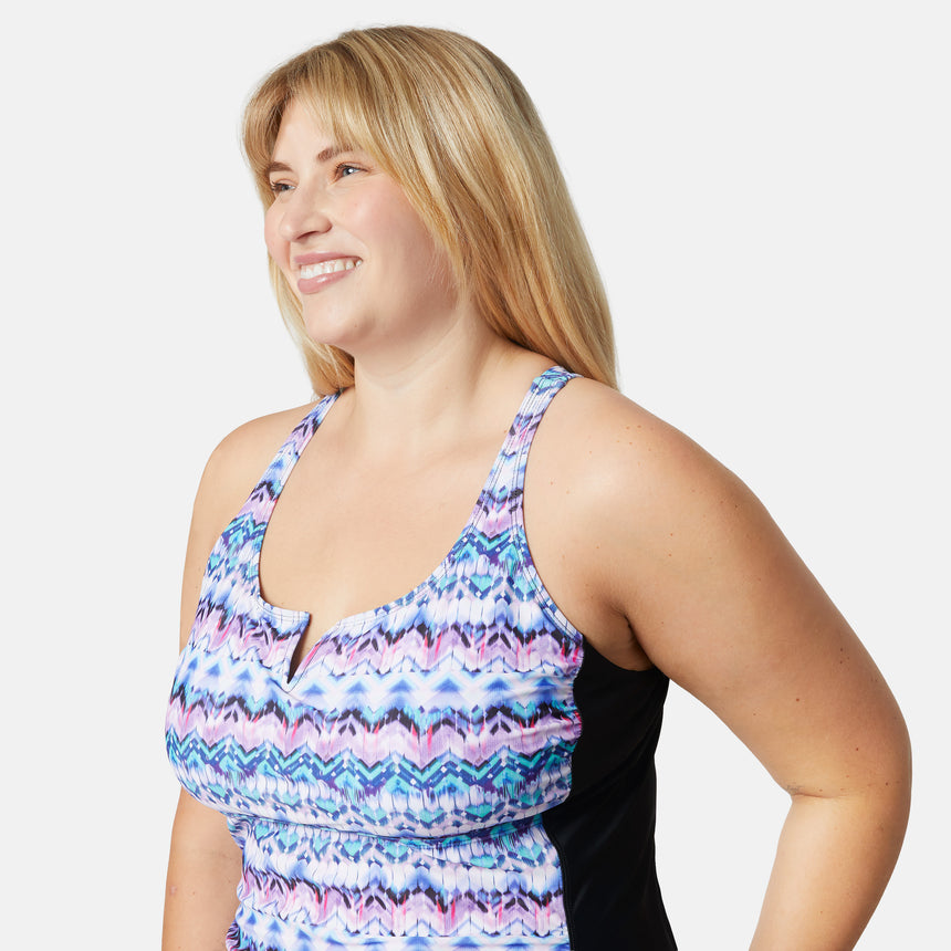 [Lola is 5'10" wearing size S] Woman wearing a colorful patterned tank top on a white background