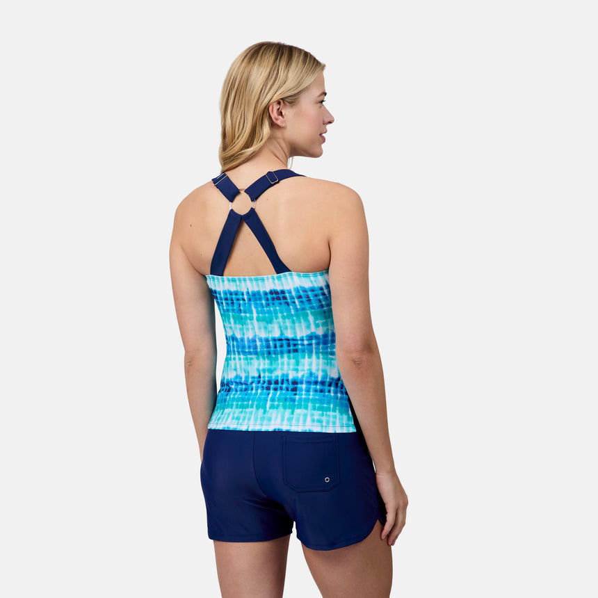 [London is 5'9.5" wearing size S] Woman wearing a blue and white patterned tank top and shorts on a white background