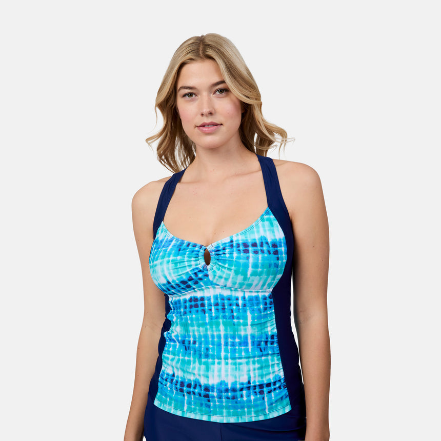 [London is 5'9.5" wearing size S] Woman wearing a blue and green patterned tank top on a white background