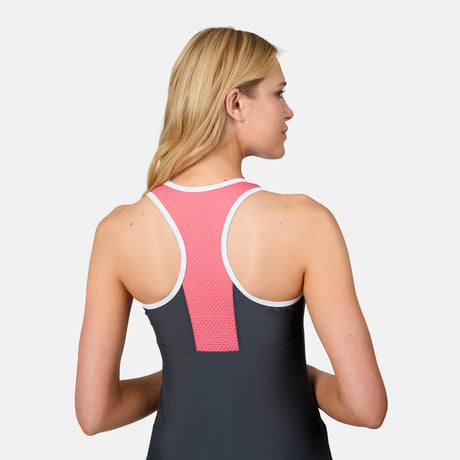 [Emily is 5'10" wearing size S] Woman wearing a black swimsuit with pink mesh panels on a white background