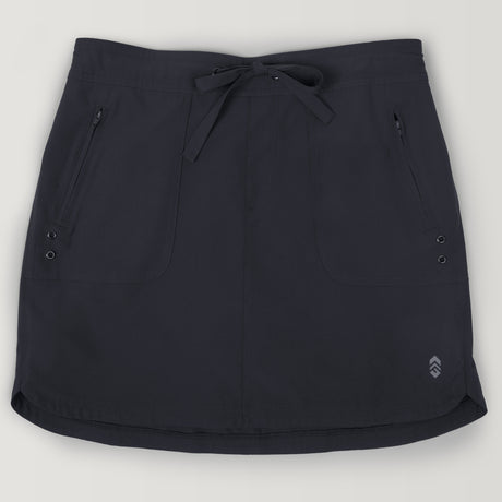 The Free Country Women's Plus Size Beach and Beyond Skort is black, knee-length, with UPF 50+ protection, a drawstring waist, two front zippered pockets, side metal grommets, a curved hem, and a small logo near the bottom right.