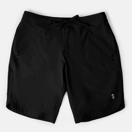 The Women's Bermuda Board Short II in black features a drawstring waist, front zippered pockets, quick-drying fabric, and a small logo near the left hem, shown against a plain white background.