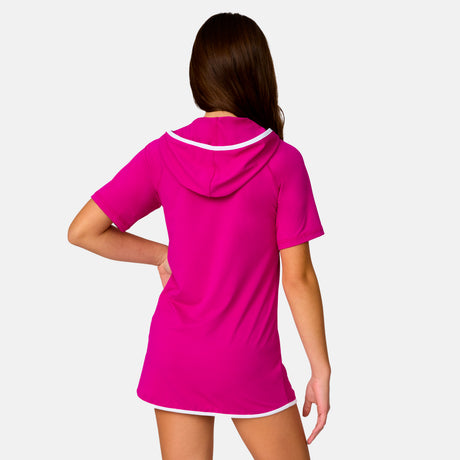 [Model is wearing a size Medium.] Girl wearing the Free Country Girls' SunFree UPF Dress in Magenta, size M, featuring lightweight recycled polyester fabric for upf protection and anti odor with an attached hood #color_ magenta