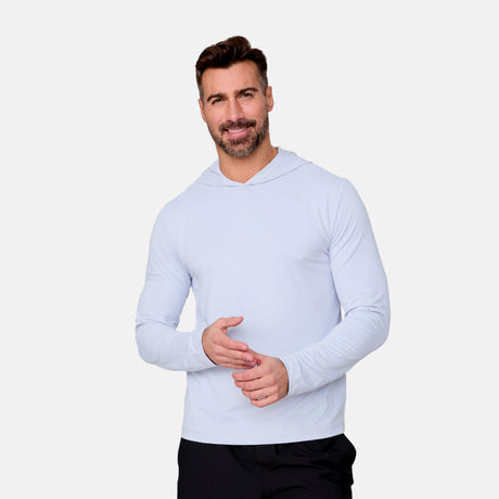 [Justin is 6'1" wearing a size Medium.] Man wearing Free Country The Everybody SunFree UPF Hoodie in Silver, size M, made from moisture wicking stretch UPF performance fabric featuring  an attached hood #color_silver