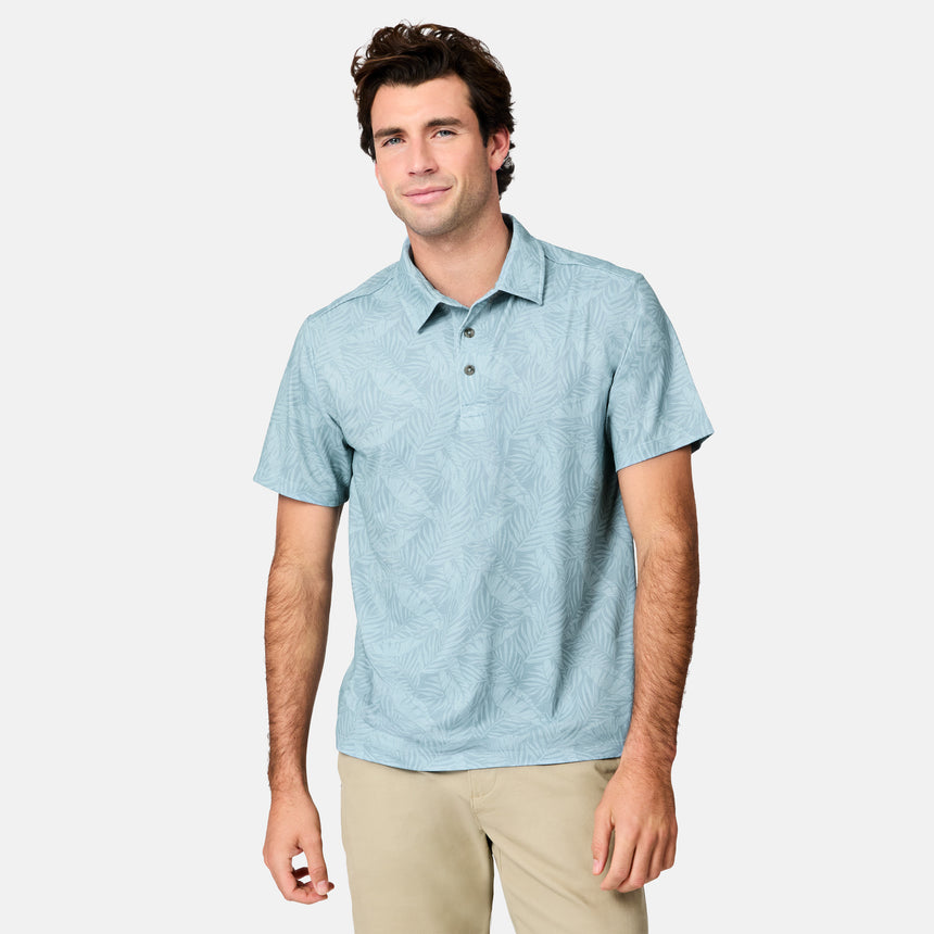 [Jacob is 6’1.5" wearing size M]Man wearing a light blue patterned polo shirt on a white background