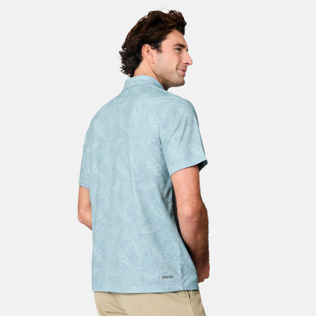 [Jacob is 6’1.5" wearing size M]Man wearing a light blue patterned polo shirt on a white background