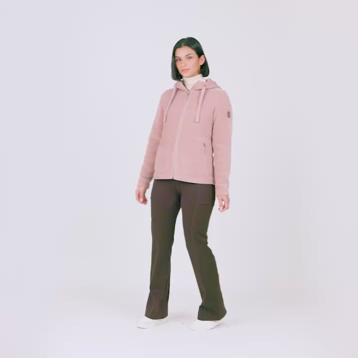 Model wearing the Women's Chenille Fleece Jacket in dusty pink, worn with dark brown pants