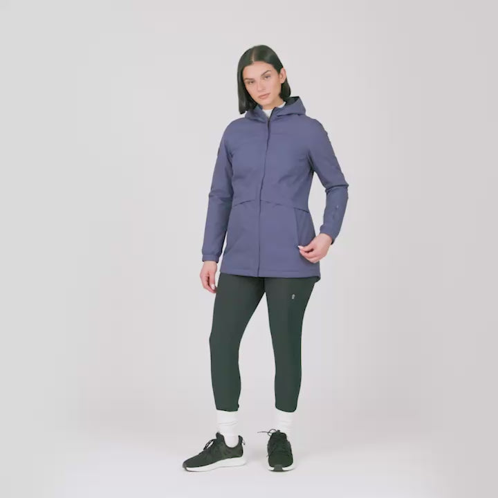 Model wearing the Women's X2O Thermo Rain Jacket in dusty purple, worn with black pants