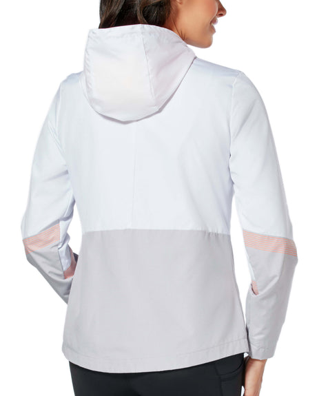 A woman with dark hair tied back is seen from the back, wearing the Clearance Women's Sporty Multi Ripstop Jacket in light gray and white with pinkish sleeve stripes and a color block design. The jacket is water resistant.