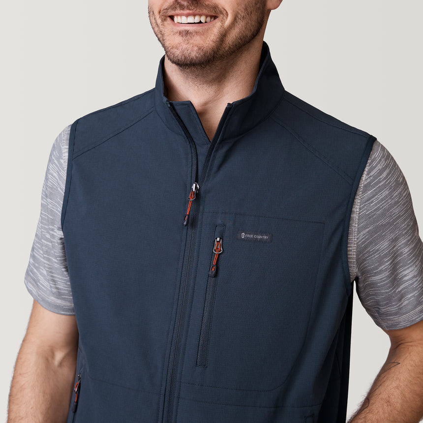 [Will is 6’2” wearing a size Medium.] Men's Stretch Rip Stop Adventure Vest - M - Storm Grey #color_storm-grey