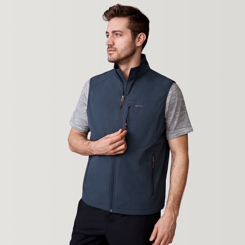 [Will is 6’2” wearing a size Medium.] Men's Stretch Rip Stop Adventure Vest - M - Storm Grey #color_storm-grey