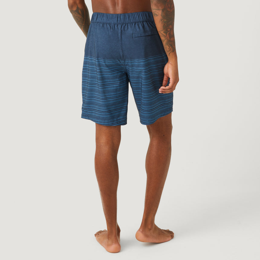 [Model is wearing a size Medium.] Men's Lake Side Stripe Surf Short - Midnight Navy #color_midnight-navy