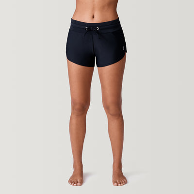 [Model is 5’9” wearing a size Small.]  Women's Drawstring Swim Boy Short - Black - S #color_black